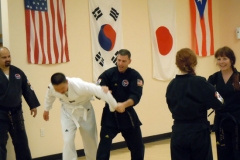 Black Belt Teaching White Belt Martial Arts