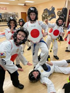 Kids posing for a sparing photo